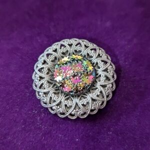 Elegant Silver Floral Brooch